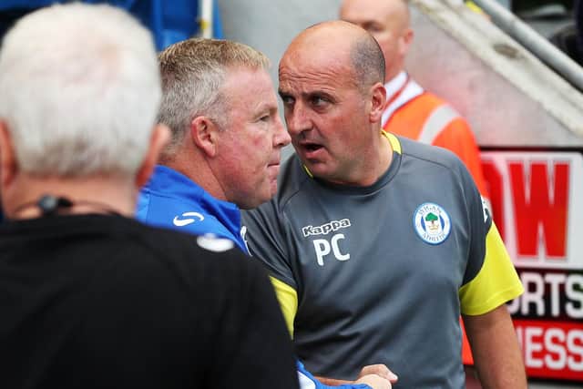 Paul Cook, right, with Pompey manager Kenny Jackett