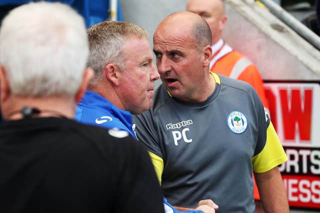 Paul Cook, right, with Pompey manager Kenny Jackett