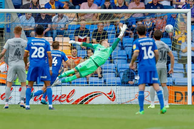 Pompey keeper Craig MacGillivray is beaten by Ryan Giles' 68th-minute effort Picture: Simon Davies