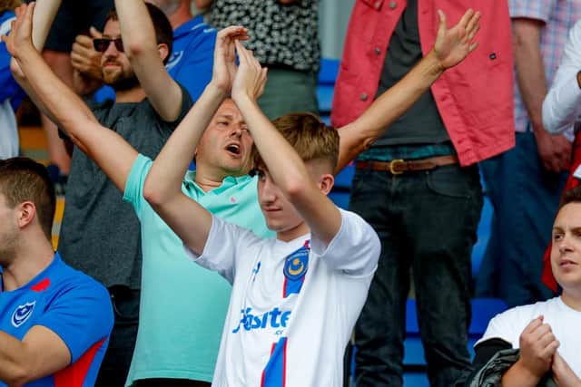 Pompey fans applaud their side at Shrewsbury. Picture: Simon Davies.