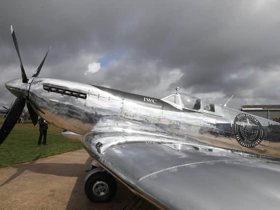 The restored World War II Silver Spitfire plane that will be used in a round-the-world flight attempt Picture: Adrian Dennis/AFP/Getty Images