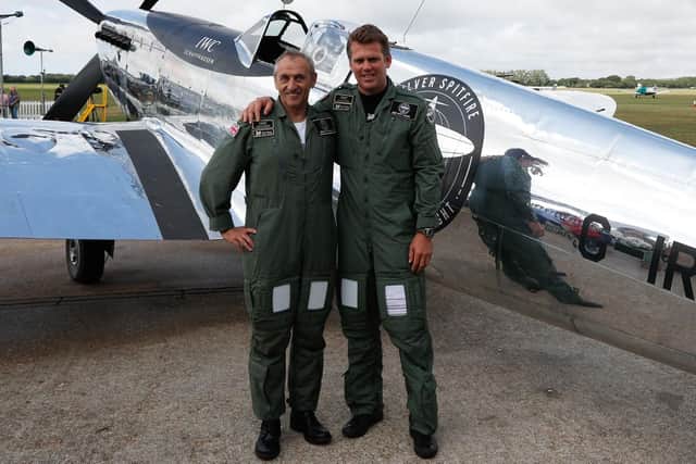 Steve Brooks, left, and Matt Jones in front of the Spitfire plane Picture: Adrian Dennis/AFP/Getty Images
