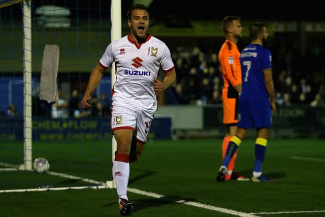 Ryan Seager celebrates scoring for MK Dons against AFC Wimbledon in 2017. Picture: Alex Pantling/Getty Images