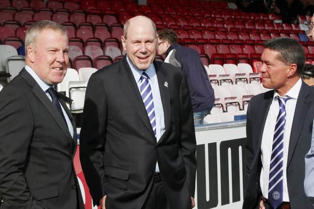 From left to right: Pompey boss Kenny Jackett, chairman Michael Eisner and chief executive Mark Catlin. Picture: Joe Pepler
