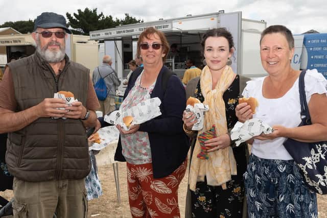 Pictured is: Phillip West, Helen Marshall, Kezia Richardson, Janice West enjoy there fish in a bun.Picture: Keith Woodland (070919-21)