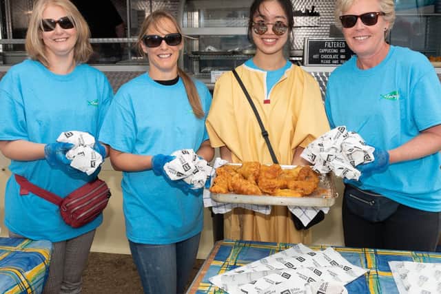 Pictured is: Helen Bolton, Elaine Hallet, Ee Wan and Wendy Evans serving the fish in buns.
Picture: Keith Woodland (070919-6)