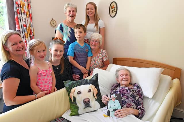 Anne Perry celebrated her 100th birthday at Wisteria Lodge, Waterlooville, surrounded by two of her three daughters, grandchildren and great-grandchildren. Picture: Malcolm Wells (190829-7021)