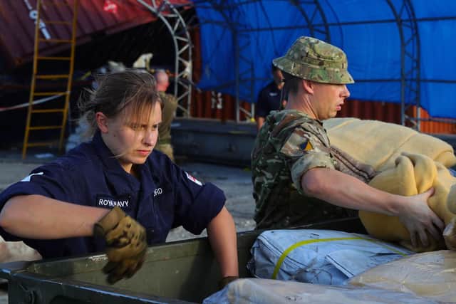 Humanitarian and Disaster Relief (HADR) teams, from RFA Mounts Bay, delivering aid to the Island of Great Abaco in the Bahamas after it was hit by Hurricane Dorian. Picture: LPhot Paul Halliwell/MoD/Crown Copyright/PA Wire