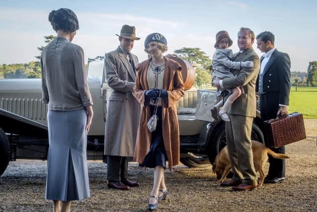 From left: Elizabeth McGovern, Harry Hadden-Paton, Laura Carmichael, Hugh Bonneville and Michael Fox, right, in a scene from Downton Abbey. Picture: Jaap Buitendijk
