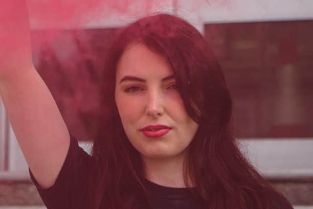 Dylan Roffey, 24, outside Brighton Magistrates Court where she is standing trial charged with criminal damage and resisting a police officer. Picture: DxeBrighton/PA Wire