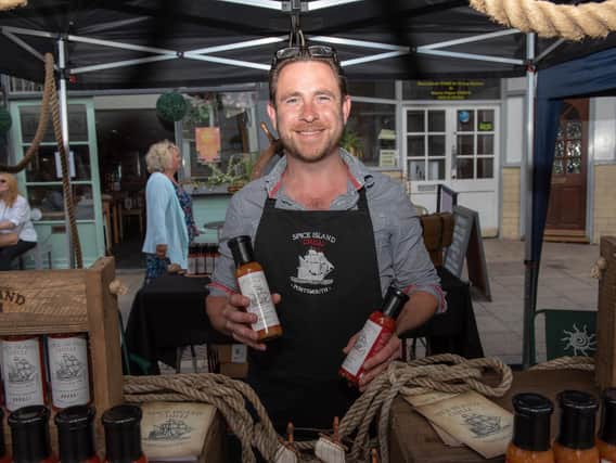 The Summer Fayre held at Castle Road in Southsea - Liam Coleman with his homemade Spice Island Chilli stall. Picture: Vernon Nash (180410-002)