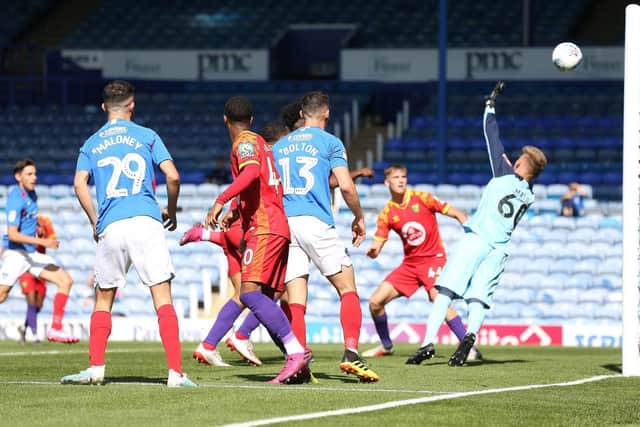 Ellis Harrison scores the first goal of the match