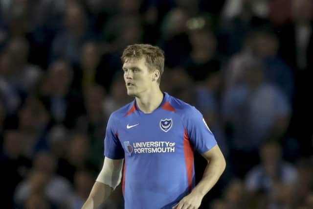 Growing into role at centre-half, but will be disappointed with goal - 6