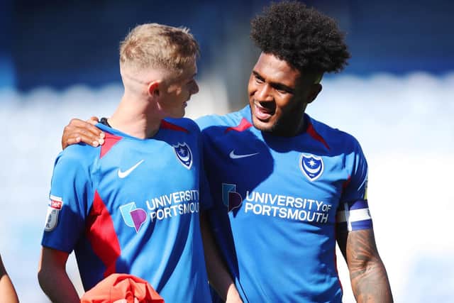 Eoin Teggart, left, Ellis Harrison at the final whistle Picture: Joe Pepler