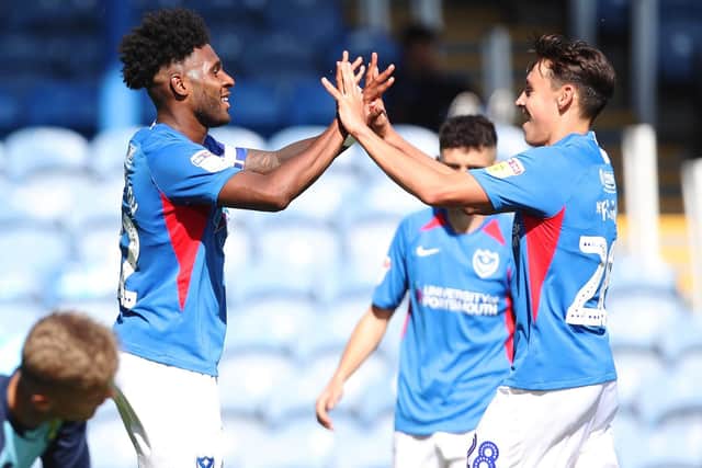 Ellis Harrison celebrates his second goal with Josh Flint during Pompey's 3-1 victory over Norwich under-21s. Picture: Joe Pepler