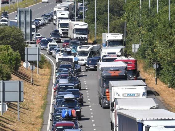 A broken down car is causing traffic congestion on the M27.