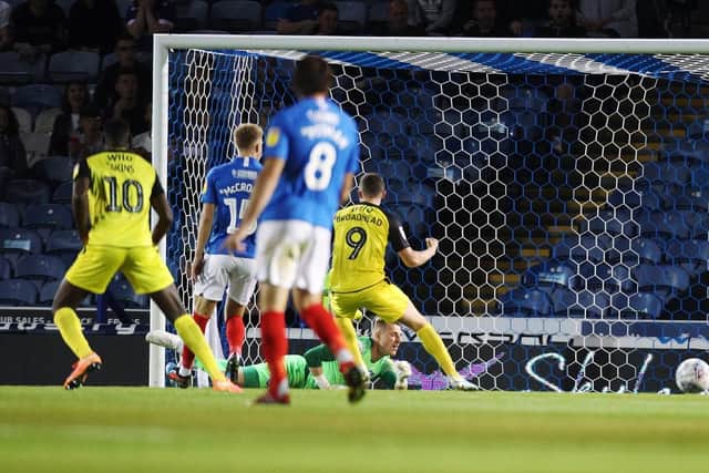 Burton's Joe Sbarra scores the first goal of the match