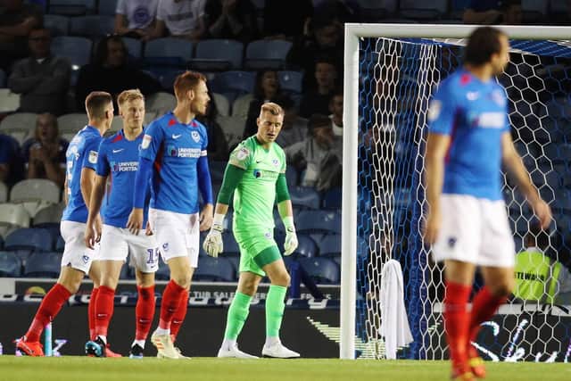 Pompey players after Burton's first goal