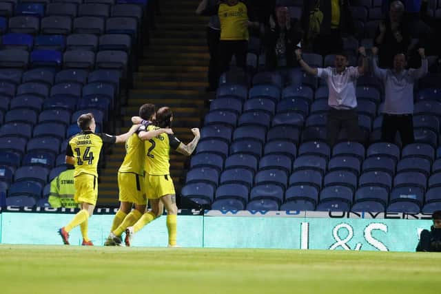 Burton celebrate scoring their second goal of the match