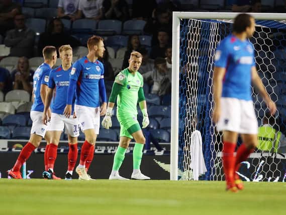 Pompey players after Burton's first goal