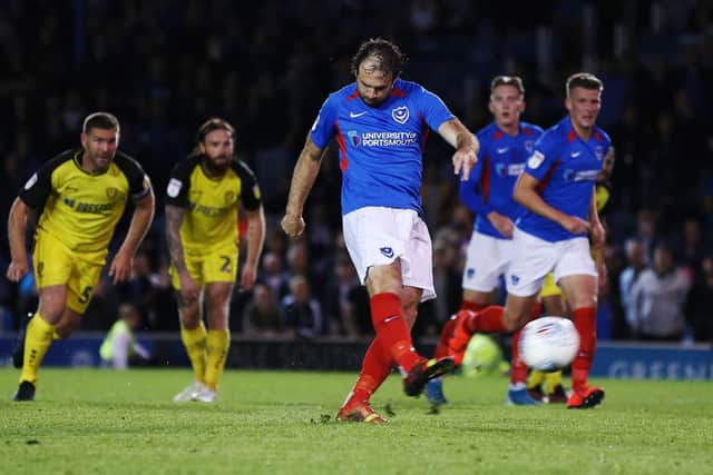 Brett Pitman scores Pompey late equaliser from the penalty spot Picture: Joe Pepler