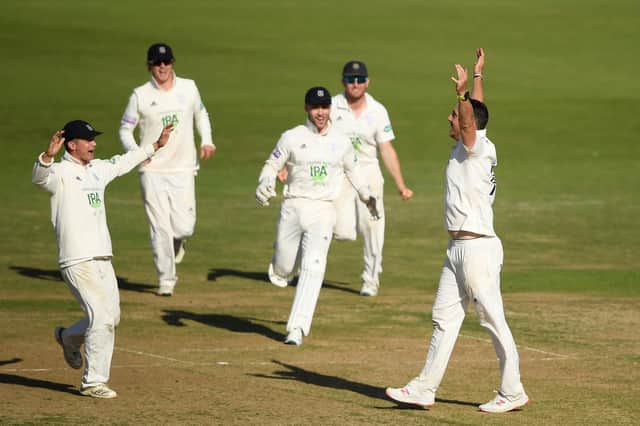 Kyle Abbott of Hampshire celebrates taking the wicket of Josh Davey  - his 17th of the match