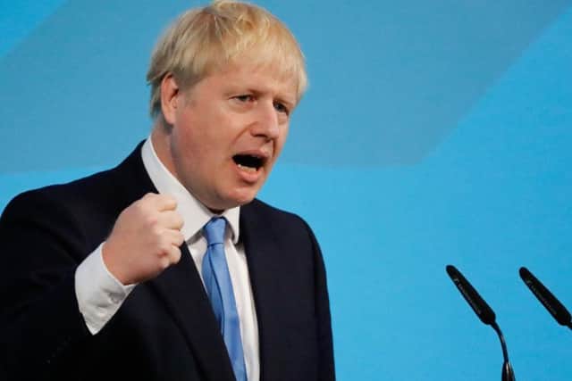 Prime minister Boris Johnson gives a speech at an event to announce the winner of the Conservative Party leadership contest in central London on July 23, 2019. (Photo by Tolga AKMEN / AFP)