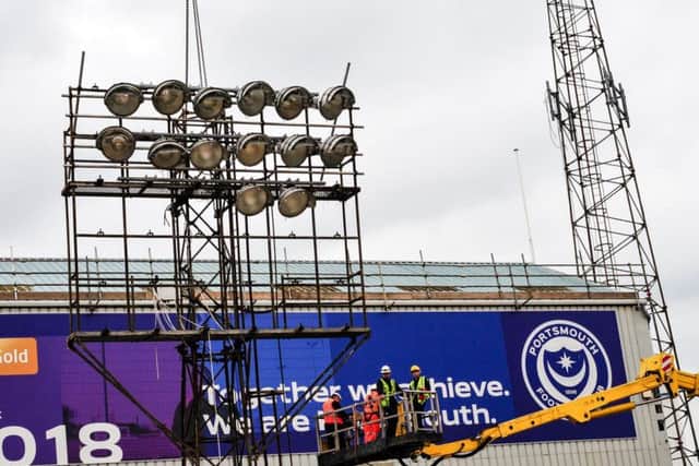 The Fratton floodlights are taken down / Picture by Colin Farmery