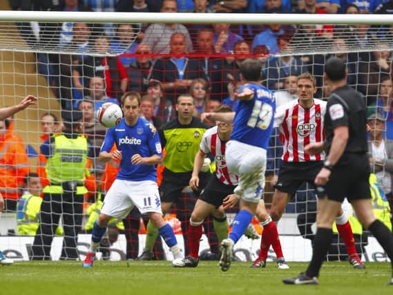 David Norris scores a famous equaliser in 2012.