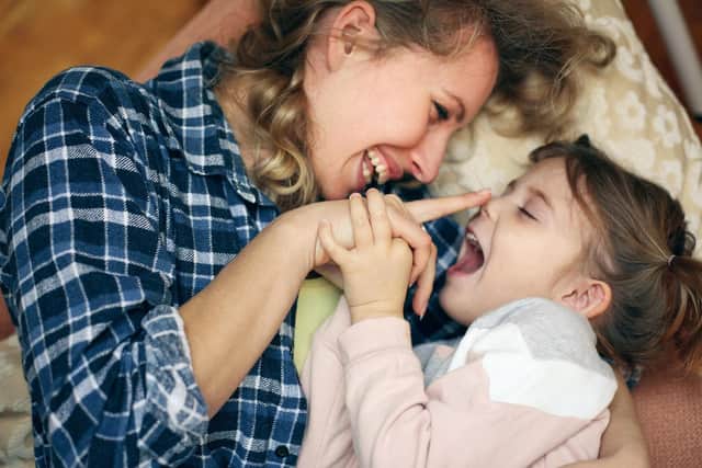 According to a new study, as long as the mother figure in the family is happy, the children will be too