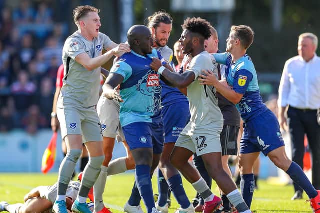 Pompey ended the game with 10 men against Wycombe after Ellis Harrison was sent off for a second yellow. Picture: Nigel Keene
