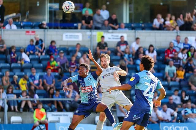 Brett Pitman heads against the bar during Pompey's loss to Wycombe. Picture: Nigel Keene