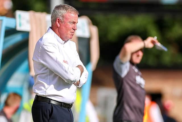 Pompey boss Kenny Jackett watches on from the sidelines at Adams Park   Picture: Nigel Keene