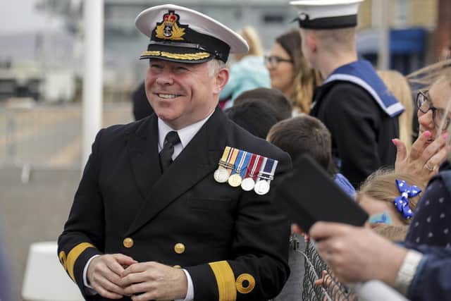 Commodore Craig Wood welcoming HMS Medway first entry to Portsmouth. Photo: LPhot Barry Swainsbury