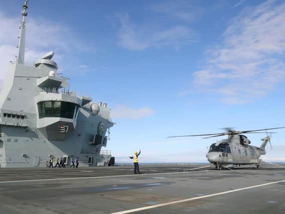 HMS Prince of Wales ticked off another huge landmark during her sea trials with the landing on deck of a Merlin from 820 Naval Air Squadron. Picture: LPhot Pepe Hogan/ MoD