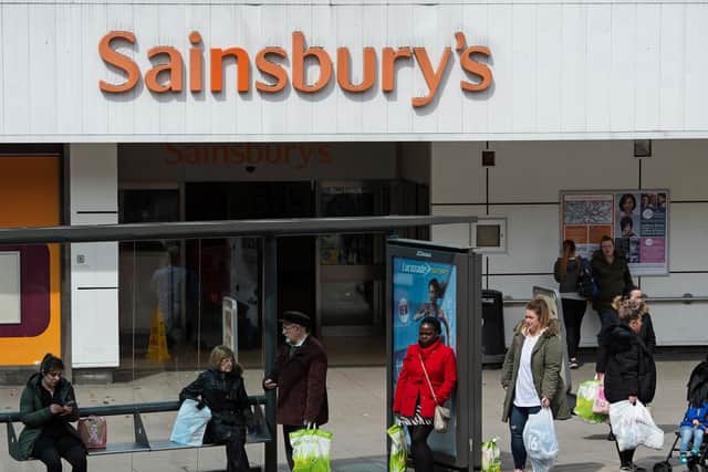 Sainsbury's has announced plans to close supermarkets and Argos stores (Picture OLI SCARFF/AFP/Getty Images)