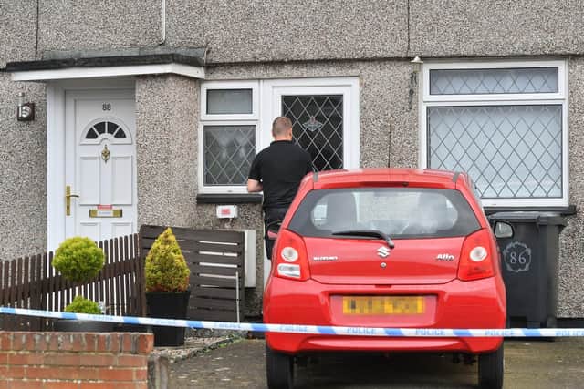 A man enters a house in the Moredon area of Swindon, during a search in connection with the disappearance of Katrice Lee, a British toddler who disappeared from a supermarket near a British military base in Paderborn, Germany, on November 28 in 1981, her second birthday. Picture: Ben Birchall/PA Wire