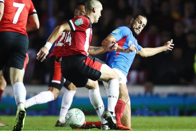 Christian Burgess in Pompey action against Southampton on Tuesday night Picture: Joe Pepler
