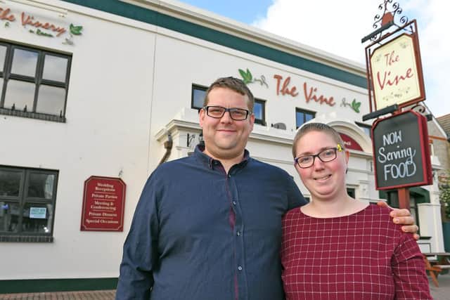 Sean Rowlands, left, and his wife Vicky outside The Vine in Gosport. Picture: Malcolm Wells (190926-7826)