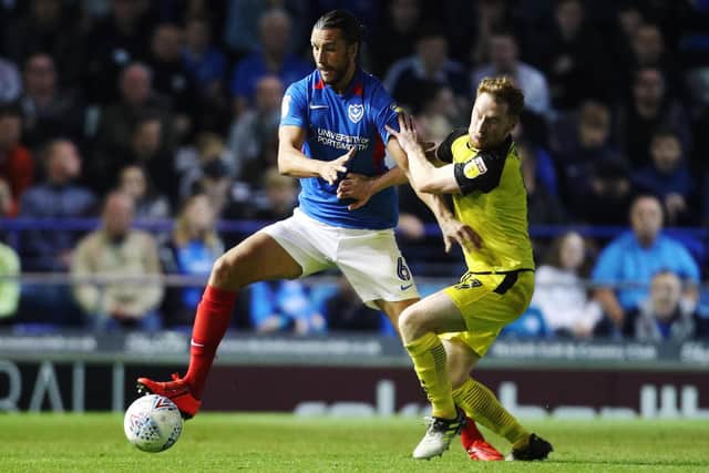 Christian Burgess in action for Pompey. Picture: Joe Pepler