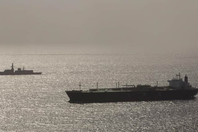Pictured: HMS Kent accompanies British shipping through the Strait of Hormuz. Picture: LPhot Dan Rosenbaum, HMS Kent