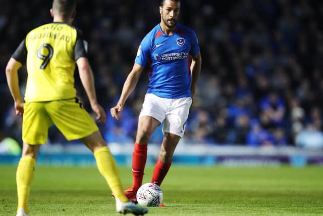 Christian Burgess enjoyed his brief spell at right-back for Pompey - but has now returned to familiar territory. Picture: Joe Pepler