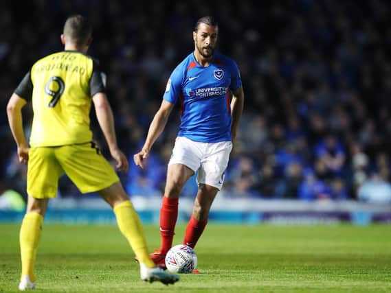 Christian Burgess enjoyed his brief spell at right-back for Pompey - but has now returned to familiar territory. Picture: Joe Pepler