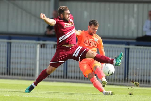 Ross Worner in action with Chelmsford's Sam Higgins
Hawks vs Chelmsford City - Vanarama National South, Westleigh Park, Havant. Photo by Dave Haines/Portsmouth News