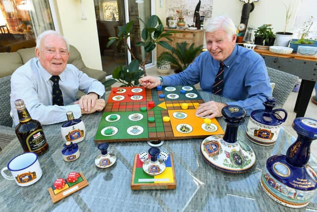 Dave Clark, left, from Southsea and Philip 'Wally' Blagden, right, from Hayling Island who are the current uckers world champions. Picture: Malcolm Wells (191002-5525)
