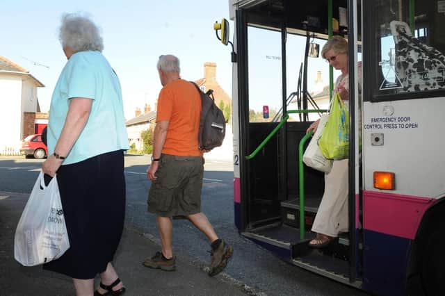 Passengers get off a bus in Portsmouth. Pictures: Ian Hargreaves  (113455-4)