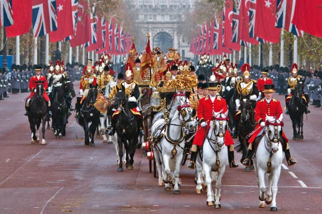 A double-standard sovereigns escort for a state visit. Here the president of Turkey accompanies the Queen to Buckingham Palace in November 2011. This escort is the highest honour the nation bestows on a visiting head of state. Photo: Dan Bernard