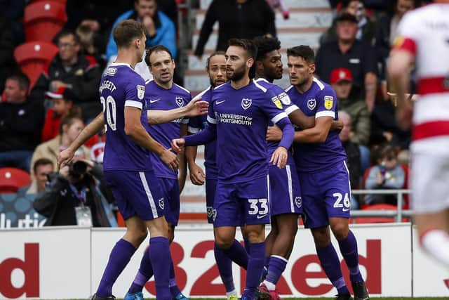 Pompey celebrate Gareth Evans' goal against Doncaster  Daniel Chesterton/PinPep)