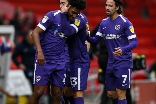 Ellis Harrison of Portsmouth celebrates after scoring his side's second goal to make the score 1-2 during the Sky Bet League One match between Doncaster Rovers and Portsmouth at Keepmoat Stadium on October 5th 2019 in Doncaster, England. (Photo by Daniel Chesterton/PinPep)