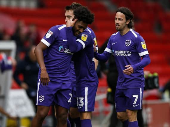 Ellis Harrison of Portsmouth celebrates after scoring his side's second goal to make the score 1-2 during the Sky Bet League One match between Doncaster Rovers and Portsmouth at Keepmoat Stadium on October 5th 2019 in Doncaster, England. (Photo by Daniel Chesterton/PinPep)